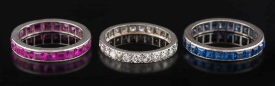 A platinum and diamond eternity ring: pave-set with 24 circular brilliant-cut stones estimated to