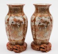 A pair of unusual Japanese Kutani vases: of quatrefoil shape with coiled Fo dog bases,