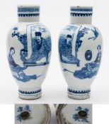 A close pair of Chinese porcelain vases: of oviform on ribbed foot and neck painted in blue with a