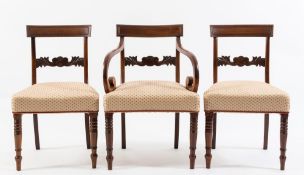 A set of eight late Regency mahogany dining chairs:,