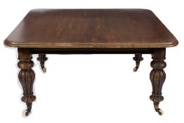 A Victorian mahogany extending dining table:, with a telescopic action,