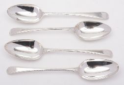 Three George III silver Old English and feather edged pattern tablespoons,