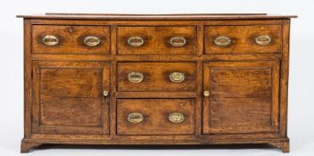 An early 19th Century oak rectangular dresser base:,