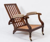 By James Shoolbread & Co - A 19th Century mahogany low adjustable armchair:,