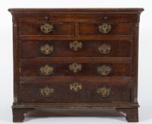 An 18th Century oak chest:, of comparatively small size,