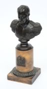A 19th century bronze head and shoulders bust of Napoleon: in uniform wearing epaulettes and medals,