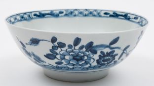 A Liverpool blue and white bowl: painted with in the Oriental manner with peonies,