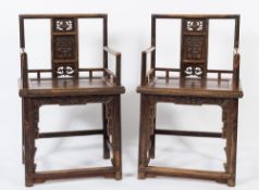 A pair of Chinese wood armchairs:,
