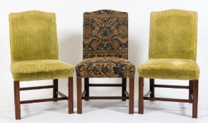 A set of six mahogany and upholstered side chairs in the Georgian taste:,