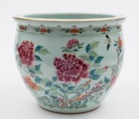 A Chinese famille rose jardiniere: painted with tree peonies, foliage and butterflies,