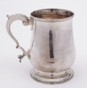 A George III silver mug, maker Thomas Wallis I, London, 1768: of plain baluster form,
