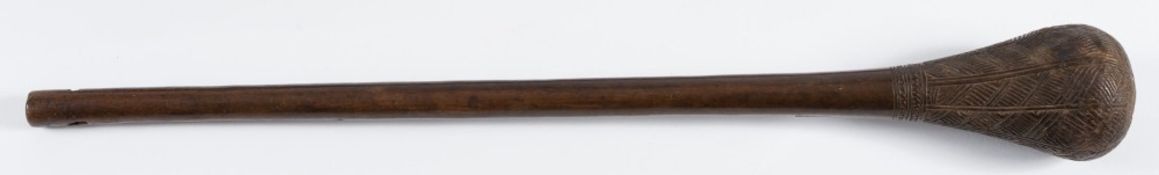 An Angolan Tchokwe club: the bulbous head with incised geometric pattern decoration,