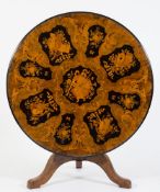 A Victorian walnut veneer, ebonised and floral marquetry circular breakfast table:,
