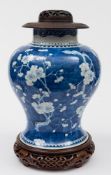 A Chinese blue and white baluster vase: with cylindrical neck and flared foot,