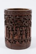 A small Chinese bamboo brush pot: of cylindrical form,