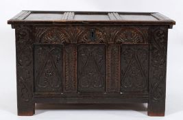 A late 17th Century carved oak coffer:, of small size,