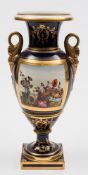A Derby two-handled baluster vase: with dolphin handles,