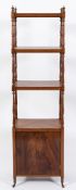 A George III mahogany four-tier whatnot:, with slender turned uprights and sides,