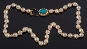 A baroque cultured pearl single string necklace: with oval, opal doublet and cultured pearl clasp:,