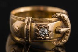An 18ct gold diamond 'buckle' ring: with hallmarks for Birmingham,