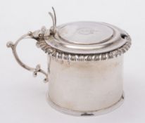 A George III Scottish silver mustard pot, maker James McKay, Edinburgh, 1819:, crested,
