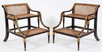 A pair of Regency ebonised and gilt decorated two tread bed steps:,
