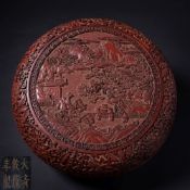 A Chinese carved cinnabar lacquer box and cover: of circular form,