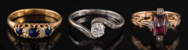 A diamond single-stone cross-over ring: the circular, brilliant-cut diamond estimated to weigh 0.