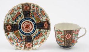 A Worcester coffee cup and saucer: of fluted form,