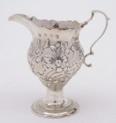 A George III silver cream jug, maker Nathaniel Appleton & Ann Smith, London,