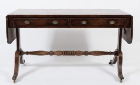 A Regency mahogany sofa table:, the hinged top with rounded corners,