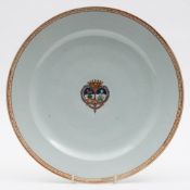 A Chinese armorial porcelain charger for the French market: of circular form,