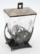 A WMF Art Nouveau period electroplated and cut glass biscuit box and cover: of wedge-shaped outline,