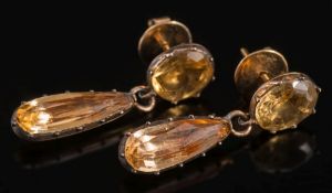 A pair of antique foiled topaz two stone drop earrings: each single oval topaz suspending a single