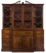 A George III mahogany breakfront secretaire library bookcase:, with pierced fret,