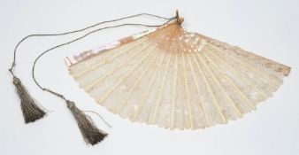 A 19th century mother of pearl and lacework fan:, 20cm long.