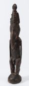 Papua New Guinea, a Wokam bird man ancestral figure: with spire shaped headdress, curved beak,