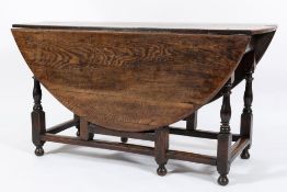 An 18th Century oak gateleg dining table:,