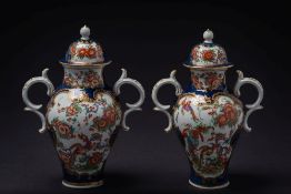 A pair of Worcester scale-blue baluster vases: of small size with double scroll handles,