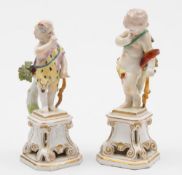 Two Bow figures of Cupids: one with left hand resting on a bow, a quiver of arrows on his back,