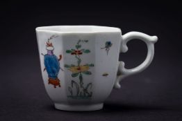 A fine early Worcester polychrome coffee cup: of octagonal form with scroll handle,