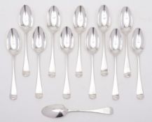 A matched set of twelve George III silver Hanoverian pattern dessert spoons,