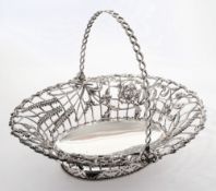 A George III silver swing-handle bread basket, maker RM possibly Richard Meach, London,