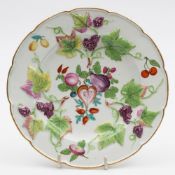 A Bow blind moulded plate probably decorated in the workshop of James Giles: of silver shape and