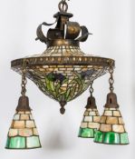 A Tiffany-style circular ceiling light:  with Iris pattern floral decoration,