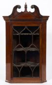 An early 19th Century mahogany hanging corner display cabinet:,