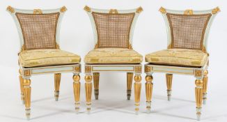 A set of six 19th Century French later blue and gilt decorated salon chairs:,