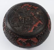 A Chinese black and red cinnabar lacquer bowl and cover: the cover decorated with figures beside a