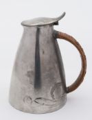 Archibald Knox design for Liberty & Co, a Tudric pewter jug and cover: model No 0307,