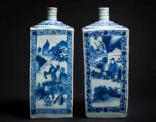 A matched pair of Chinese blue and white square-section bottles: with ribbed cylindrical necks,